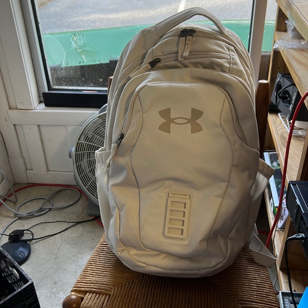 Uses White Under Armor Backpack